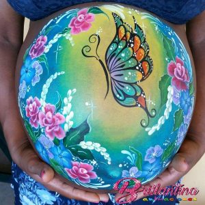 Belly Painting de mariposa.